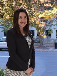 smiling woman in dress clothes